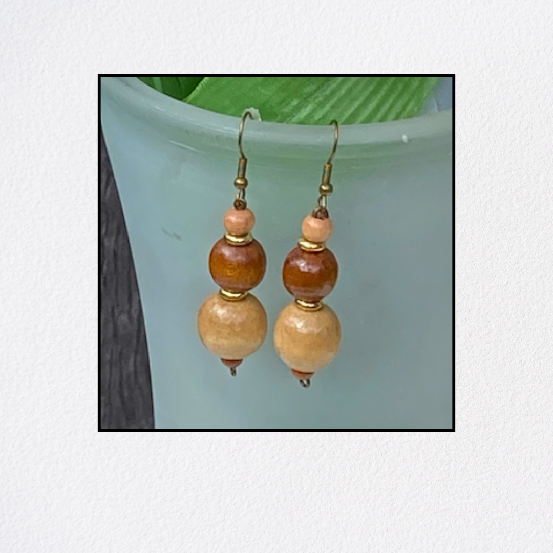 Light pink flower bead on earring post.